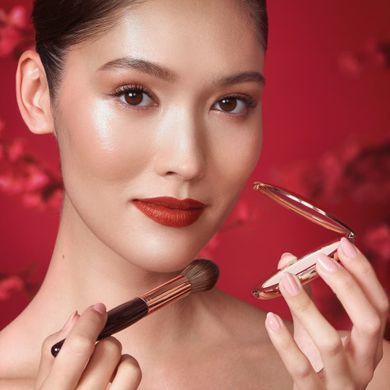 Фото Компактна пудра для обличчя Charlotte Tilbury Airbrush Flawless Finish Lunar New Year 1 Fair/Pale 1 Fair Pale